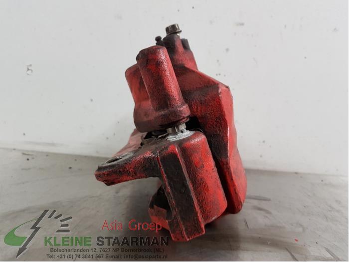 Front brake calliper, left from a Mazda 6 Sportbreak (GY19/89) 2.0i 16V S-VT 2007