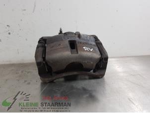 Used Front brake calliper, right Nissan Qashqai (J11) 1.2 DIG-T 16V Price on request offered by Kleine Staarman B.V. Autodemontage