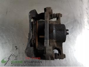 Used Front brake calliper, right Nissan Qashqai (J11) 1.2 DIG-T 16V Price on request offered by Kleine Staarman B.V. Autodemontage