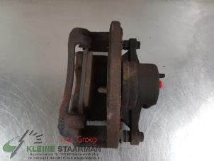 Used Front brake calliper, right Kia Cee'd (JDB5) 1.4i 16V Price on request offered by Kleine Staarman B.V. Autodemontage