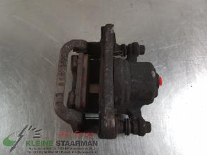 Used Rear brake calliper, left Nissan Qashqai (J10) 2.0 16V Price on request offered by Kleine Staarman B.V. Autodemontage