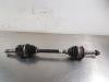 Front drive shaft, left from a Toyota Yaris III (P13), 2010 / 2020 1.5 16V Hybrid, Hatchback, Electric Petrol, 1.497cc, 74kW (101pk), FWD, 1NZFXE, 2015-04 / 2017-03, NHP13 2020