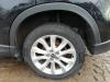 Wheel arch strip from a Mazda CX-5 (KE,GH), 2011 2.0 SkyActiv-G 16V 2WD, SUV, Petrol, 1.997cc, 121kW (165pk), FWD, PE, 2011-11 / 2017-06, KEC97; KEF97 2014