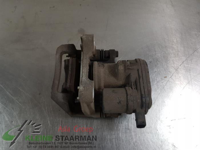Rear brake calliper, left from a Hyundai i30 Wagon (PDEF5) 1.4 T-GDI 16V 2018