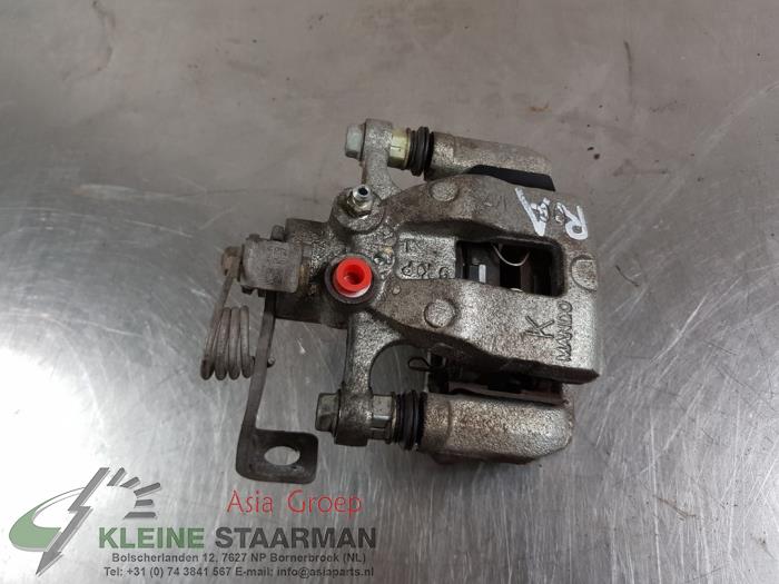 Rear brake calliper, right from a Kia Stonic (YB) 1.0i T-GDi 12V 2020
