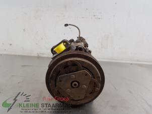 Used Air conditioning pump Suzuki Swift (SF310/413) 1.3i 5-Drs. Price on request offered by Kleine Staarman B.V. Autodemontage