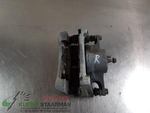 Used Front brake calliper, right Nissan Qashqai (J11) 1.3 DIG-T 160 16V Price on request offered by Kleine Staarman B.V. Autodemontage