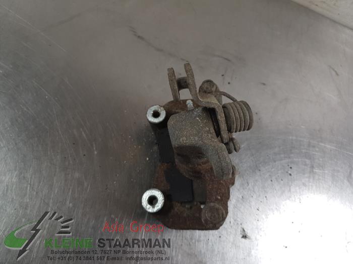 Rear brake calliper, left from a Mazda 6 SportBreak (GH19/GHA9) 2.2 CDVi 16V 163 2012