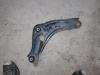 Front lower wishbone, left from a Nissan Qashqai (J11) 1.3 DIG-T 140 16V 2020