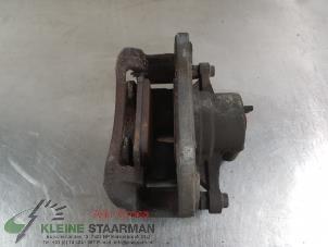 Used Front brake calliper, right Kia Cee'd (JDB5) 1.6 GDI 16V Price on request offered by Kleine Staarman B.V. Autodemontage