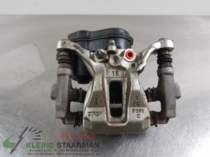 Used Rear brake calliper, left Toyota Corolla (E21/EA1/EH1) 1.2 16V Turbo Price on request offered by Kleine Staarman B.V. Autodemontage