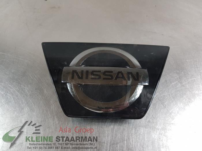Emblem van een Nissan Qashqai (J11) 1.6 dCi 2017