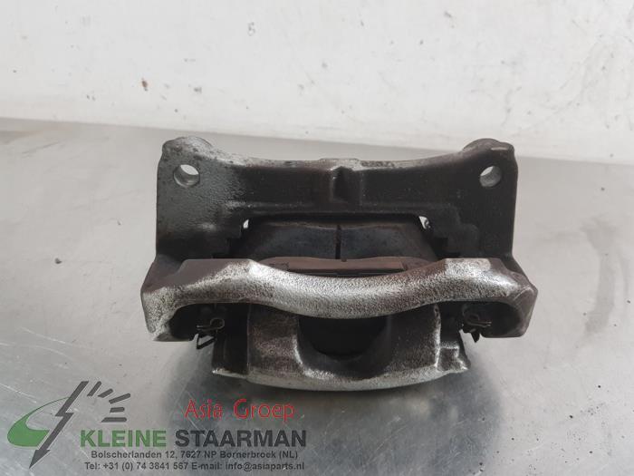 Front brake calliper, left from a Mazda 3 (BP) 2.0 SkyActiv-X 180 M Hybrid 16V 2019