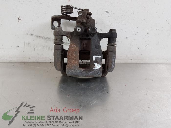 Rear brake calliper, left from a Hyundai i10 (B5) 1.2 16V 2017