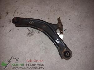 Used Front lower wishbone, left Nissan Qashqai (J10) 2.0 16V Price on request offered by Kleine Staarman B.V. Autodemontage