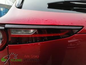 Używane Tylne swiatlo pozycyjne lewe Mazda CX-30 (DM) 2.0 e-SkyActiv X 186 M Hybrid 16V Cena € 150,00 Procedura marży oferowane przez Kleine Staarman B.V. Autodemontage