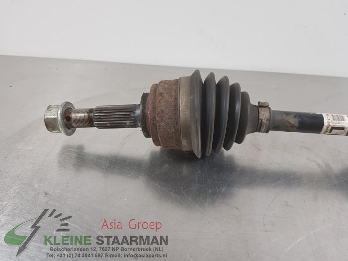 Front drive shaft, left from a Nissan Note (E12) 1.2 DIG-S 98 2016