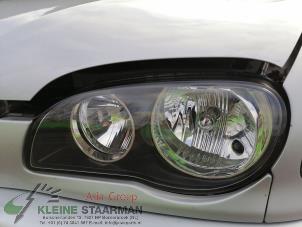 Gebrauchte Scheinwerfer links Toyota Corolla (EB/WZ/CD) 1.6 16V VVT-i Preis auf Anfrage angeboten von Kleine Staarman B.V. Autodemontage