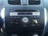 Radio CD player from a Suzuki SX4 (EY/GY), 2006 1.6 16V 4x2, SUV, Petrol, 1.590cc, 88kW (120pk), FWD, M16AVVT, 2009-07, EYA21; GYA21 2010