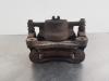 Pinza de freno derecha delante de un Nissan X-Trail (T31) 2.0 16V XE,SE,LE 4x4 2008