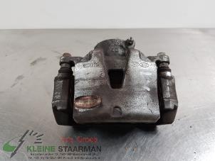 Used Front brake calliper, left Kia Sportage (QL) 1.6 GDI 132 16V 4x2 Price on request offered by Kleine Staarman B.V. Autodemontage