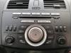 Reproductor de CD y radio de un Mazda 3 Sport (BL14/BLA4/BLB4) 2.0i MZR 16V 2011