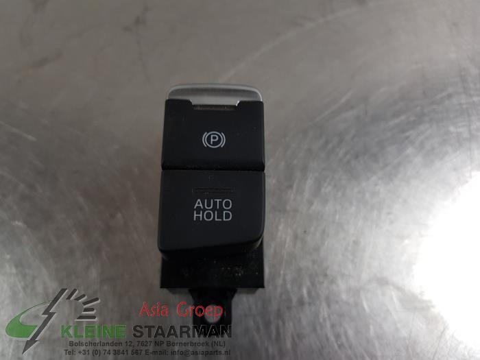 Parking brake switch from a Mazda CX-5 II (KF) 2.0 SkyActiv-G 165 16V 2WD 2021