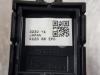 Parking brake switch from a Mazda CX-5 II (KF) 2.0 SkyActiv-G 165 16V 2WD 2021