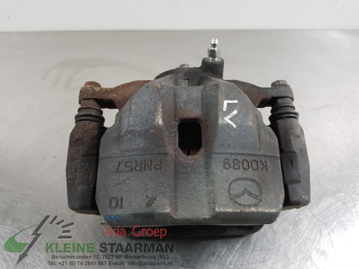 Front brake calliper, left from a Mazda 6 (GJ/GH/GL) 2.2 SkyActiv-D 150 16V 2016