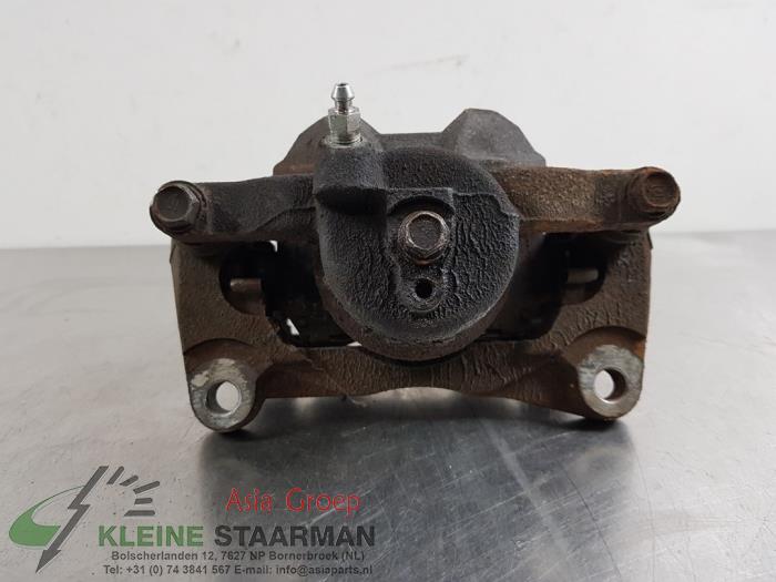 Front brake calliper, left from a Mazda 6 (GJ/GH/GL) 2.2 SkyActiv-D 150 16V 2016