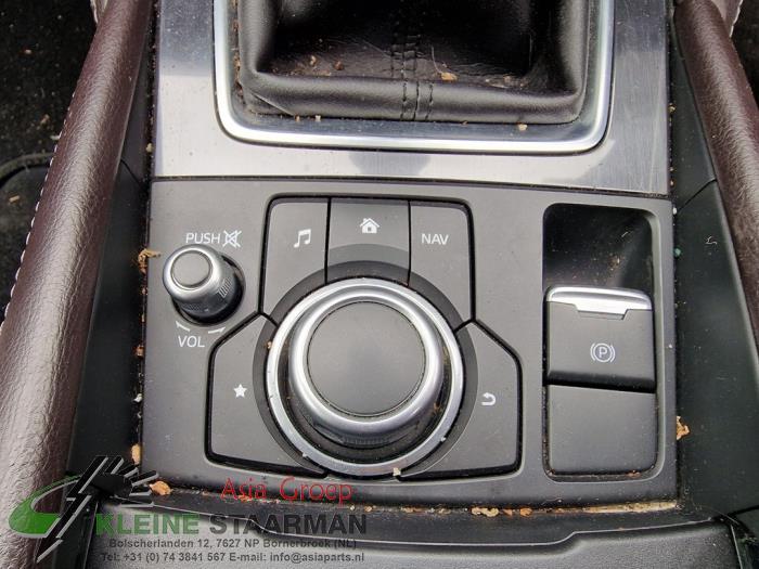 Navigation control panel from a Mazda 6 (GJ/GH/GL) 2.2 SkyActiv-D 150 16V 2016