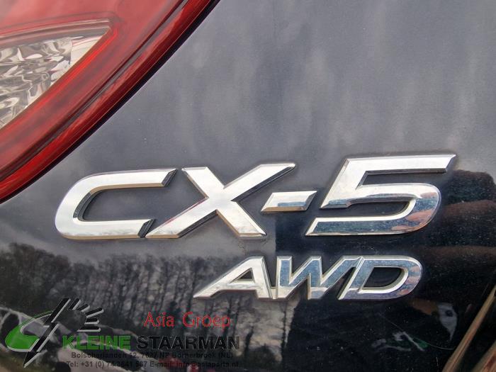 Querlenker unten links hinten van een Mazda CX-5 (KE,GH) 2.2 Skyactiv D 16V High Power 4WD 2016