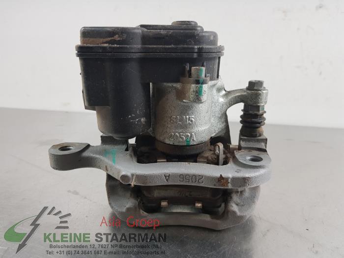 Rear brake calliper, right from a Nissan Leaf (ZE1) 40kWh 2018