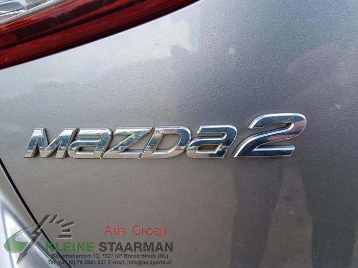 Rear gas strut, left from a Mazda 2 (DJ/DL) 1.5 SkyActiv-G 90 2016