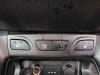 Seat heating switch from a Hyundai iX35 (LM), 2010 / 2015 1.7 CRDi 16V, SUV, Diesel, 1.685cc, 85kW (116pk), FWD, D4FD, 2010-11 / 2015-09, F5D31; F5D41 2014