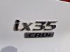 Joint arrière droit d'un Hyundai iX35 (LM), 2010 / 2015 1.7 CRDi 16V, SUV, Diesel, 1.685cc, 85kW (116pk), FWD, D4FD, 2010-11 / 2015-09, F5D31; F5D41 2014