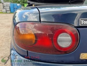 Gebrauchte Rücklicht links Mazda MX-5 (NA18/35/6C/8C) 1.8i 16V Preis € 65,00 Margenregelung angeboten von Kleine Staarman B.V. Autodemontage