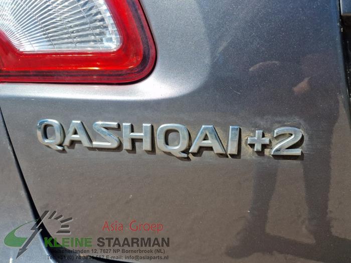 Amortiguador izquierda detrás de un Nissan Qashqai (J10) 1.6 dCi Pure Drive 2013