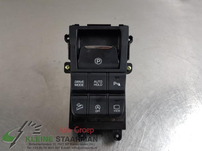 Interruptor de freno de mano de un Hyundai Tucson (TL) 1.6 T-GDi 16V 2WD 2019