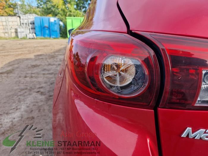 Taillight, left from a Mazda 3 (BM/BN) 2.0 SkyActiv-G 165 16V 2016