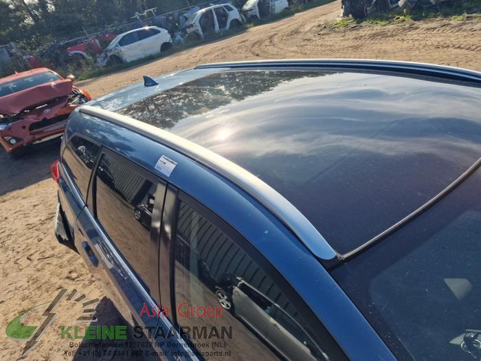 Toit panoramique d'un Toyota Auris Touring Sports (E18) 1.8 16V Hybrid 2016