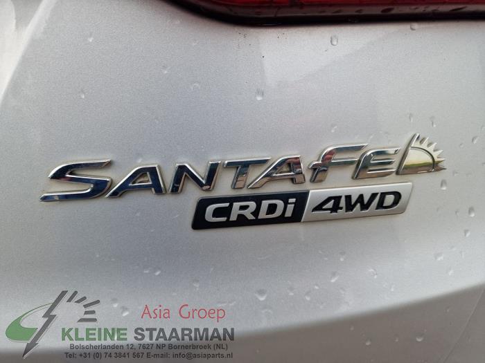 Bras de suspension haut arrière droit d'un Hyundai Santa Fe III (DM) 2.2 CRDi R 16V 4x4 2014