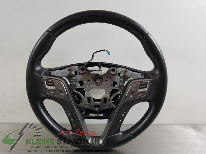 Steering wheel from a Hyundai Santa Fe III (DM) 2.2 CRDi R 16V 4x4 2014