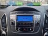 Radio CD player from a Hyundai iX35 (LM), 2010 / 2015 1.7 CRDi 16V, SUV, Diesel, 1.685cc, 85kW (116pk), FWD, D4FD, 2010-11 / 2015-09, F5D31; F5D41 2013