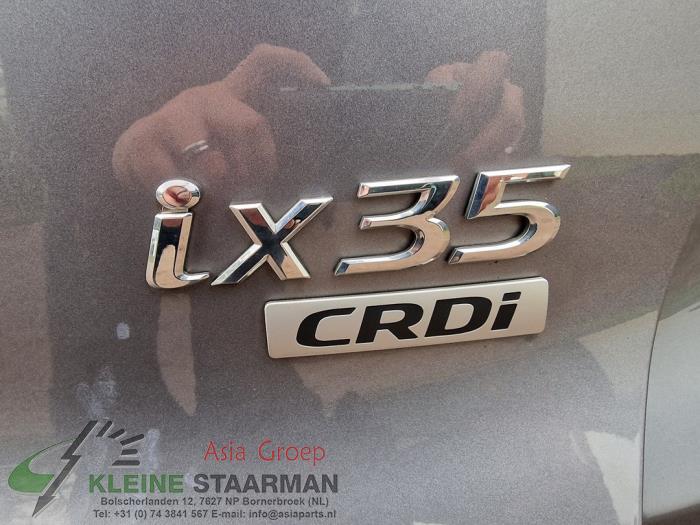 Wahacz zawieszenia górny lewy tyl z Hyundai iX35 (LM) 1.7 CRDi 16V 2015