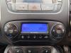 Heater control panel from a Hyundai iX35 (LM), 2010 / 2015 1.7 CRDi 16V, SUV, Diesel, 1.685cc, 85kW (116pk), FWD, D4FD, 2010-11 / 2015-09, F5D31; F5D41 2015