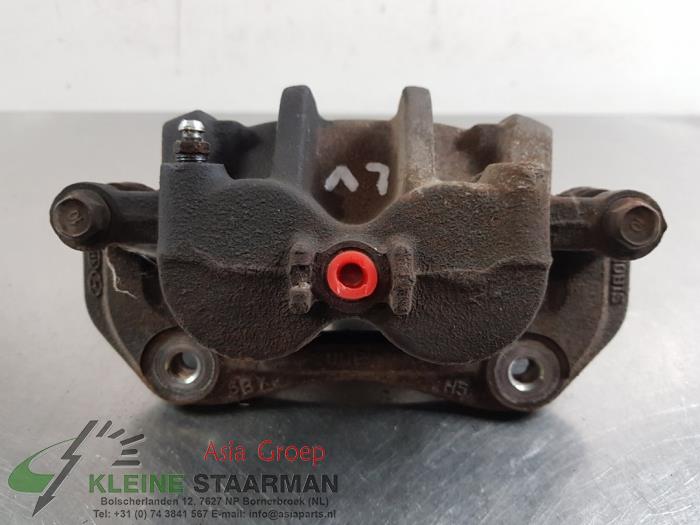 Front brake calliper, left from a Kia Sorento III (UM) 2.2 CRDi 16V VGT 4x4 2015
