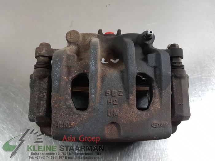 Front brake calliper, left from a Kia Sorento III (UM) 2.2 CRDi 16V VGT 4x4 2015
