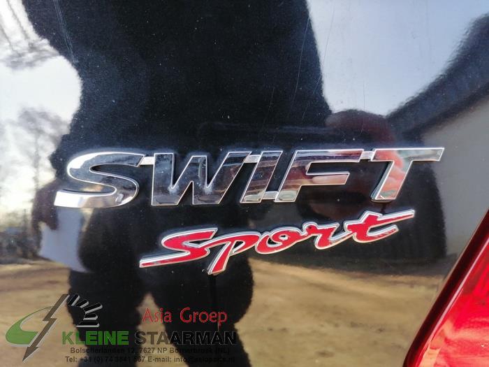 Rear shock absorber, left from a Suzuki Swift (ZC/ZD) 1.4 Booster Jet Sport Turbo 16V 2019