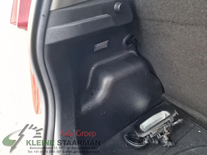 Boot lining left from a Kia Picanto (TA) 1.0 12V 2016